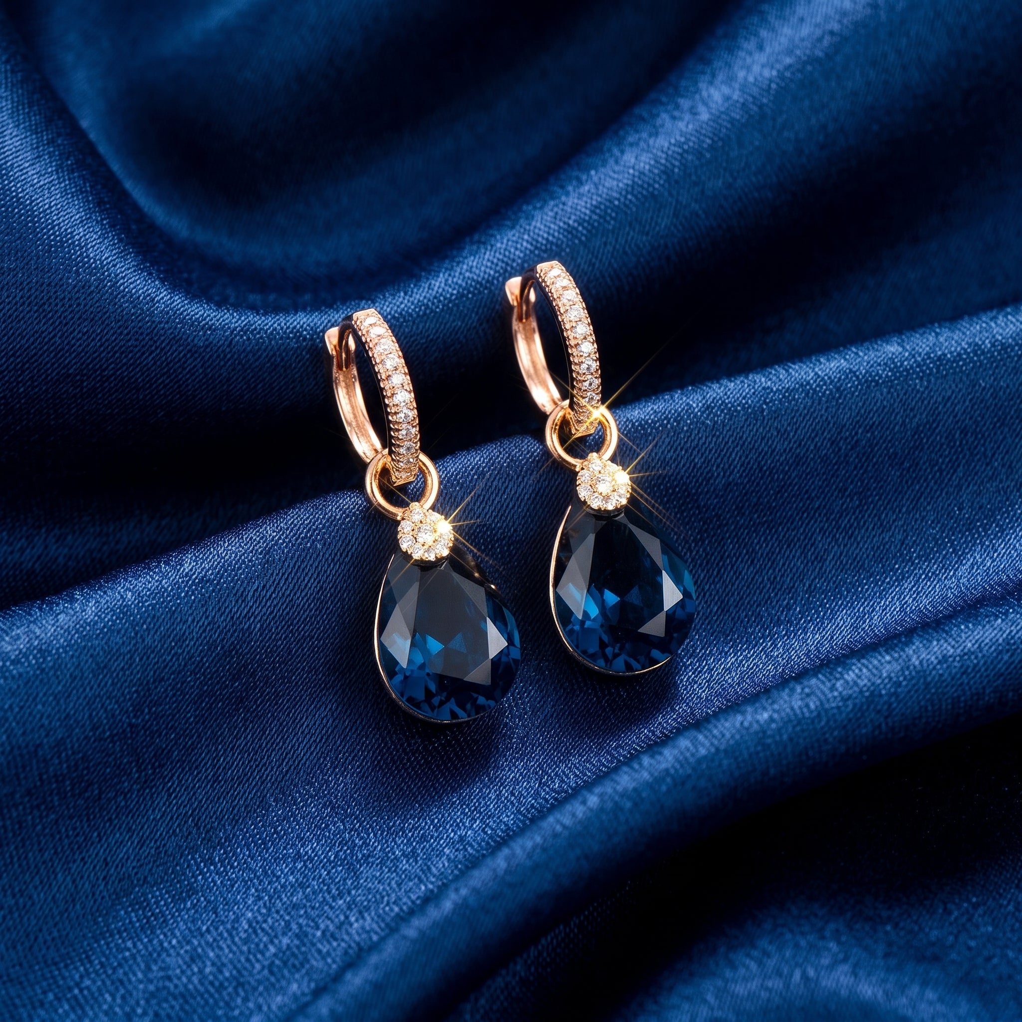 The Royal Blue Teardrop Huggie Earrings
