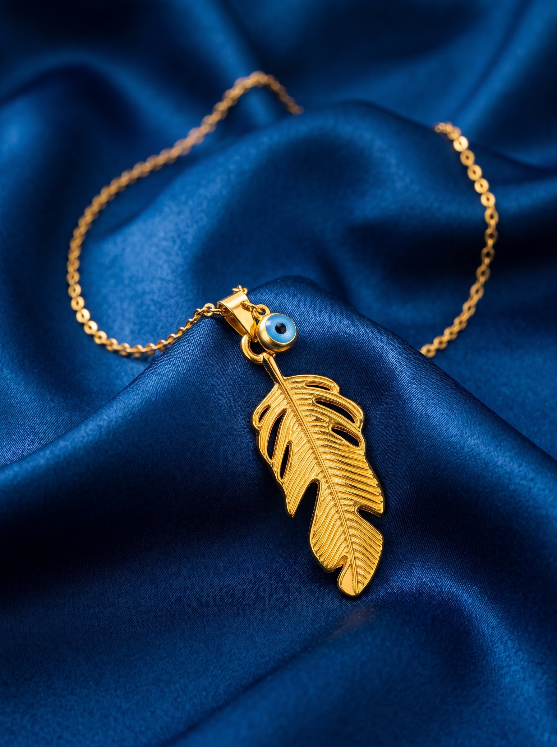The Golden Feather & Evil Eye Charm Necklace