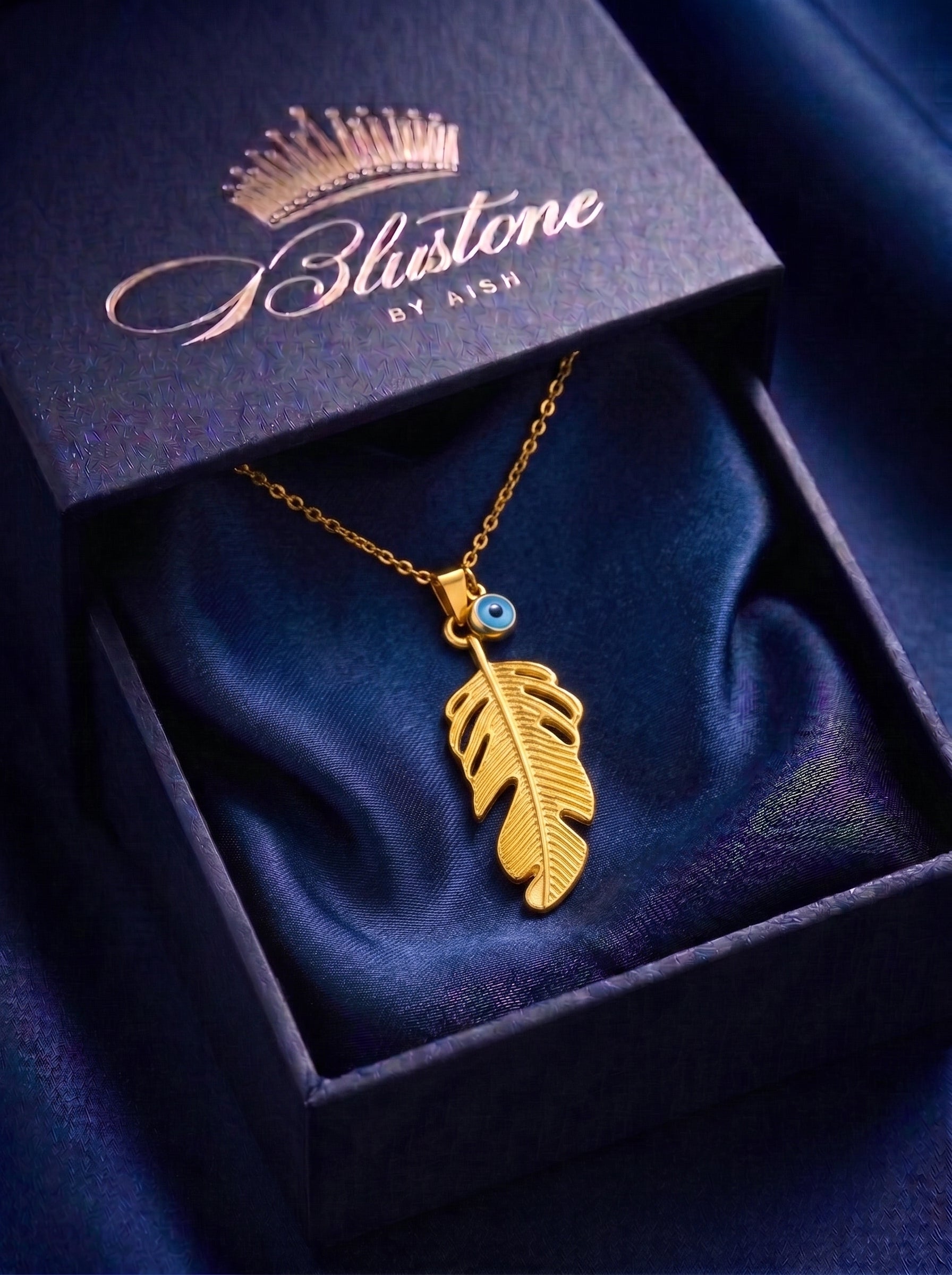 The Golden Feather & Evil Eye Charm Necklace