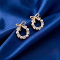 Monarch Bow Pearl Earrings
