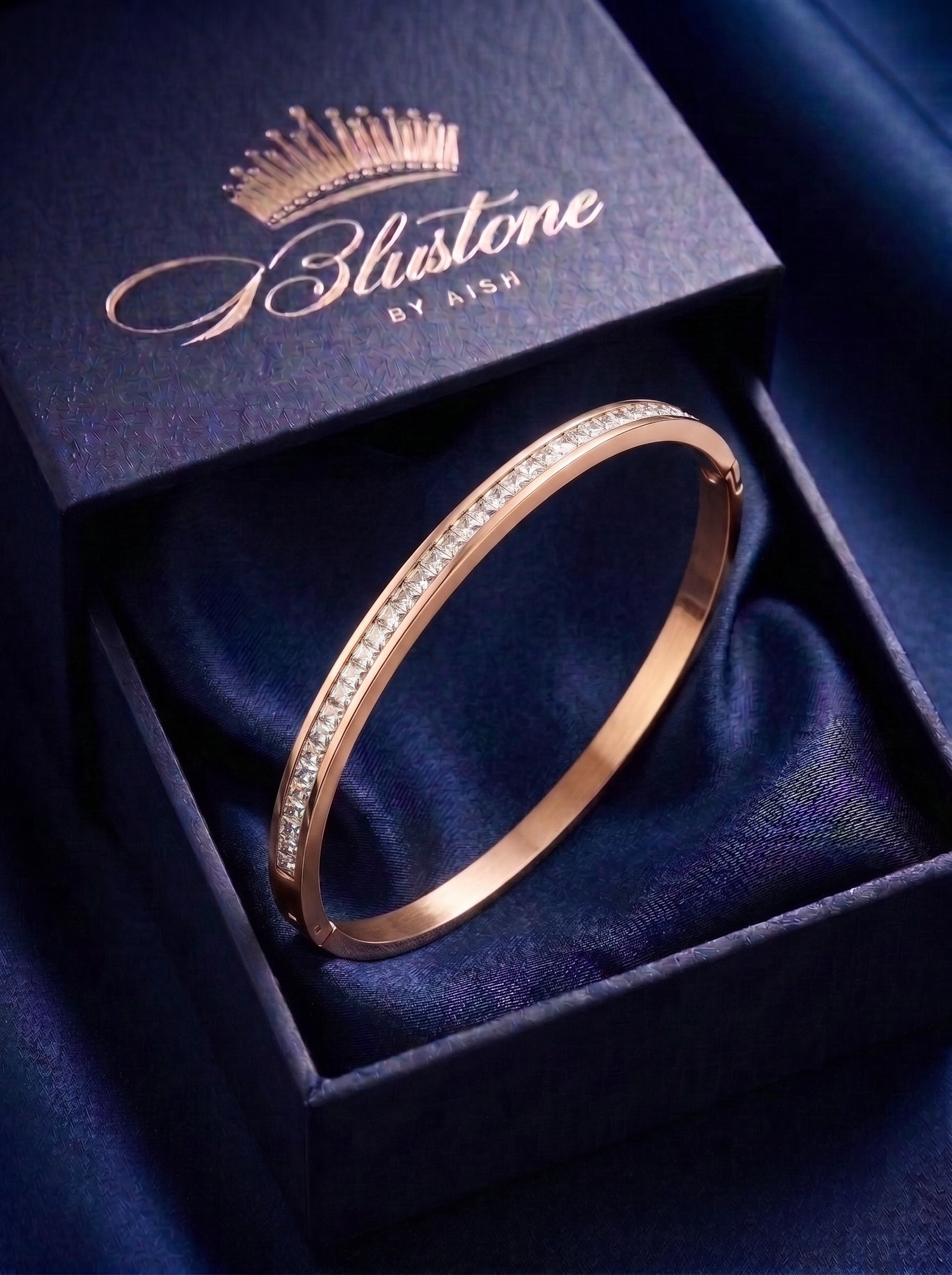 The Channel-Set Rose Gold and silver Bangle