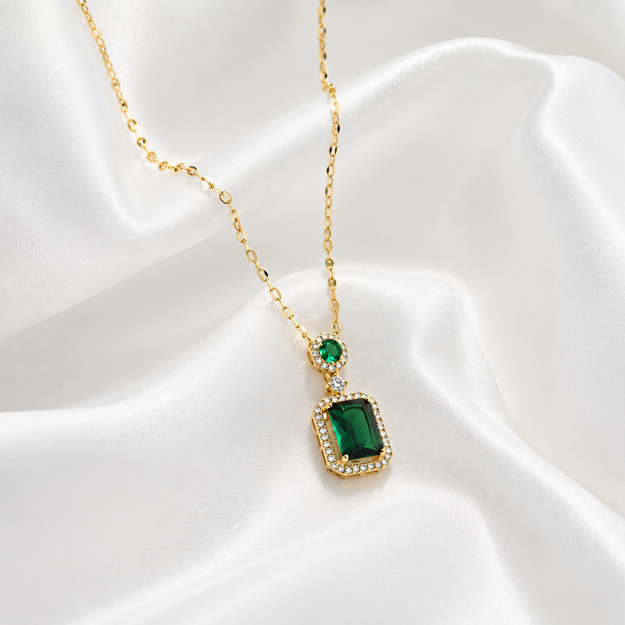 the emerald halo pendant the emerald halo pendant